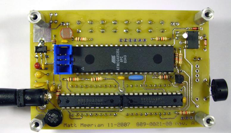 Blue Clock (Atmel Atmega8535 microcontroller). The top of the circuit board