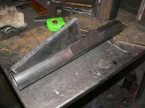 Pictured above is the previously mentioned tail bracket being setup for welding to the tail pivot.