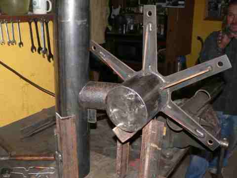 The alternator head jigged up to weld to the yaw bearing