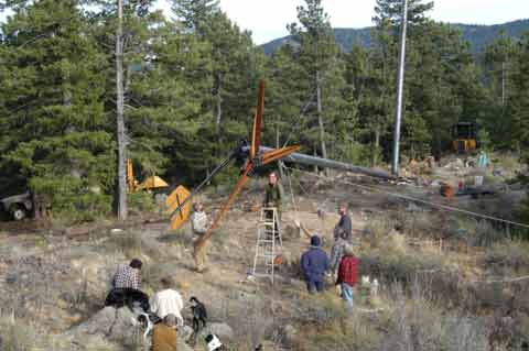 Once the tower is finished we assemble the machine on it, hook up the wires and balance the blades.