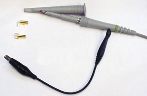 A standard oscilloscope probe has a ground lead that can pick up noise.