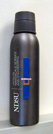 One of the antennaless RFID tags, on a metal flask