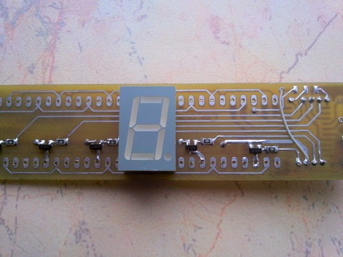 Seven 7-segment multiplexed displays with common anode mounted on PCB