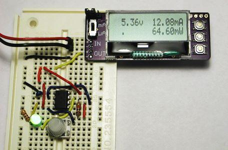 Measuring power consumption of a 555 timer circuit generating a 100Hz signal. 