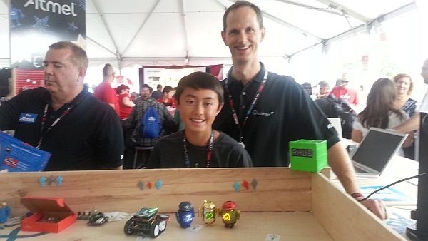 Quin and his Dad showing off some of his Arduino-powered 