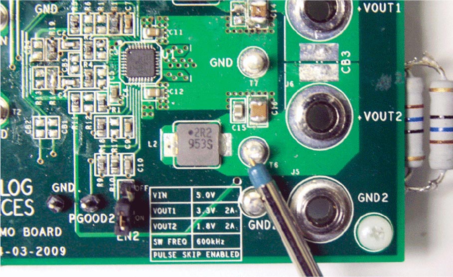 Tip-and-barrel method probed on random point of switcher's output.