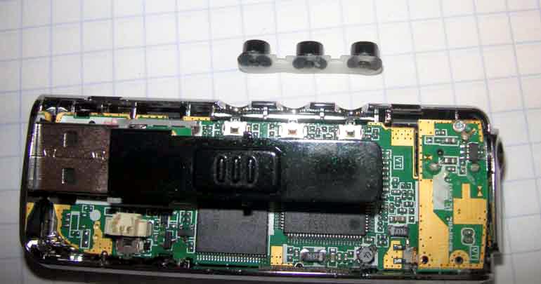 The buttons operate side-mounted tact switches on the main PCB.
