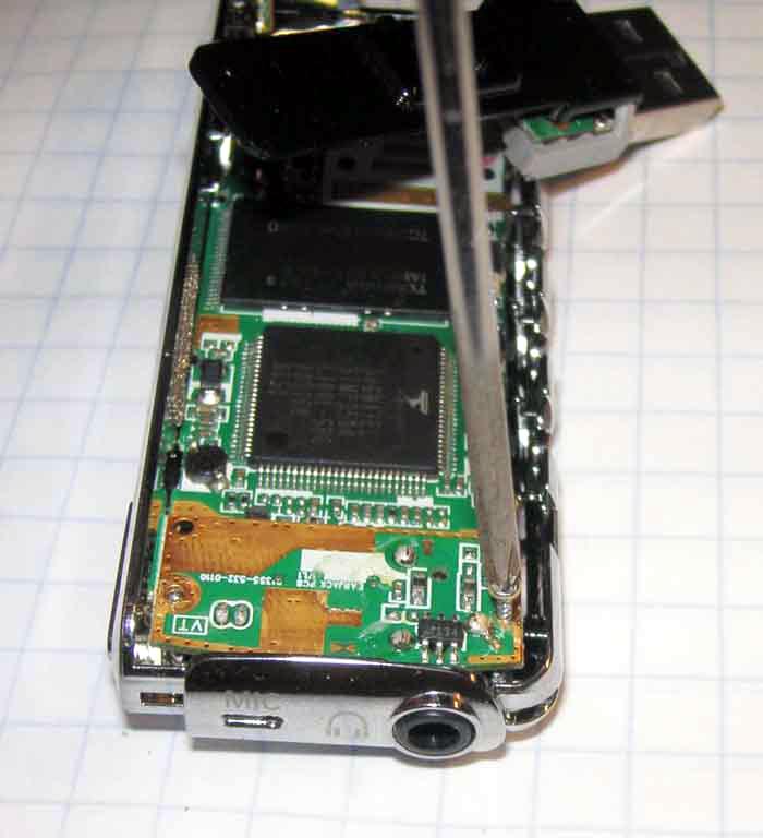 The headphone jack is mounted on a small mezzanine PCB.