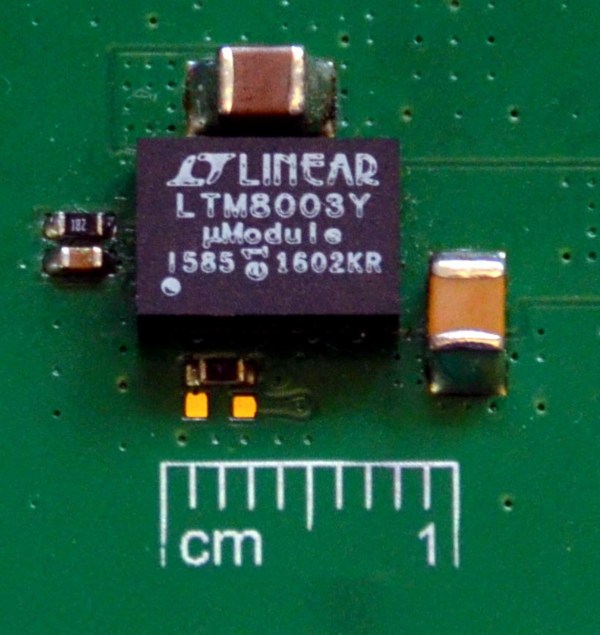 A complete step-down solution is barely larger than the 6.25 mm × 9 mm footprint of the LTM8003 µModule regulator.