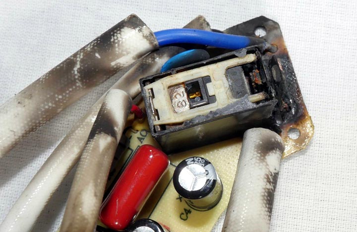 This relay burned up inside a Cuisinart tea kettle. The top is removed to view the internal damage, which was extensive. Non-hermetic relays can be a problem in wet environments.