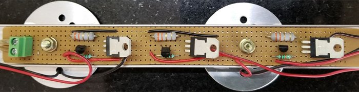 This close-up of the PCB shows the lamp's three current limiter circuits.