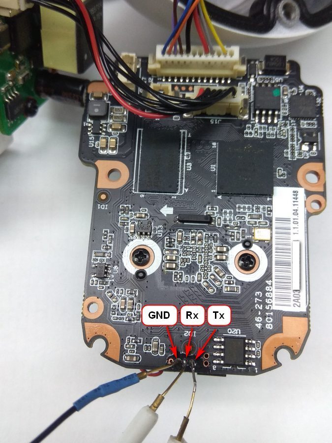 Connecting the USB-UART adapter to the pins of the IP-camera debug interface.