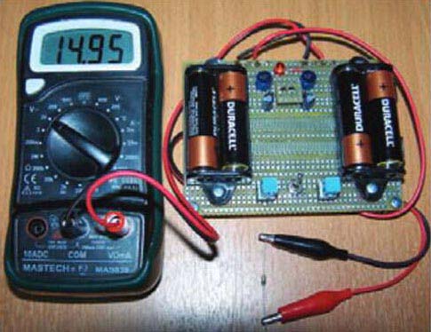 Measure the voltage across a zener diode with a digital multimeter.