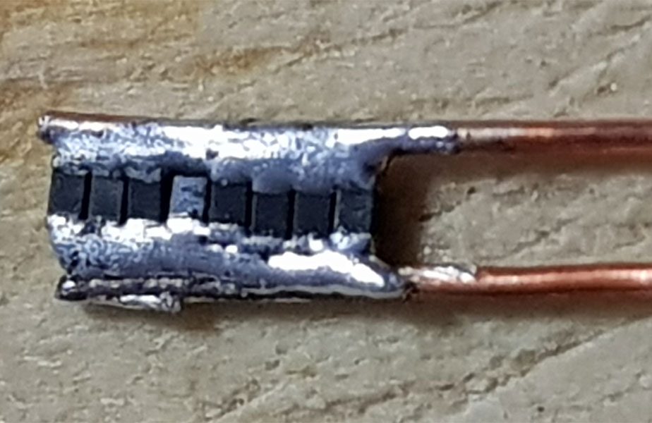 This is a 1.25 kΩ thermistor made from eight 10 kΩ thermistors wired in parallel.