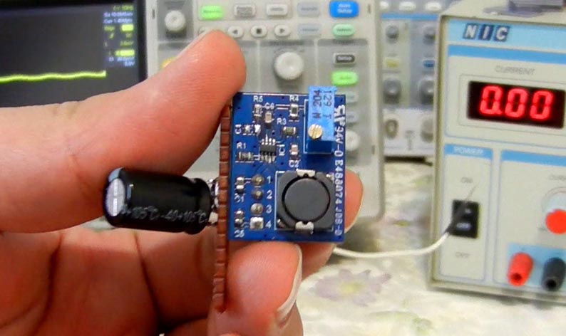 The converter board on a small piece of DIY prototype board (including a 470 &micro;F output capacitor).