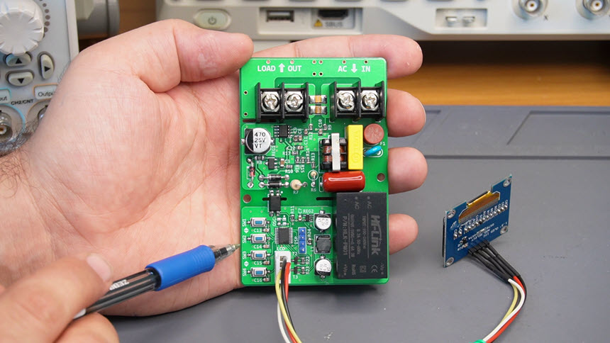 Assembled PCB board of the AC energy meter circuit.